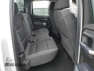2017 Chevrolet Silverado 1500 LT with VIN 1GCVKREC3HZ216455, listed as a Copart auction lot 52576385 with 73,528 mi miles and Salvage Title. Bid and sale history available at DreamBid. Image 10.