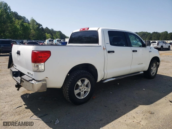 2011 Toyota Tundra 4WD Truck with VIN 5TFDW5F1XBX182216, listed as a Copart auction lot 52607815 with 216,755 mi miles and Salvage Title. Bid and sale history available at carsss.com. Image 3.
