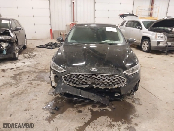 2020 Ford Fusion Hybrid Titanium with VIN 3FA6P0RU8LR141355, listed as a IAAI auction lot 41417807 with 61,288 mi miles. Bid and sale history available at carsss.com. Image 6.