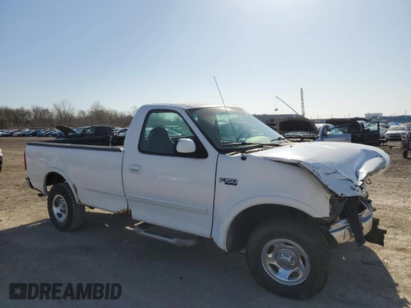 2000 Ford F-150 XL with VIN 1FTZF1825YKB19373, listed as a Copart auction lot 52078555 with 124,452 mi miles and Salvage title. Bid and sale history available at DreamBid. Image 4.