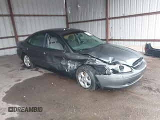 2003 Ford Taurus SE Standard with VIN 1FAFP53U73G155213, listed as a IAAI auction lot 42541473 with 200,717 mi miles and . Bid and sale history available at DreamBid. Image 1.