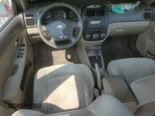 2009 Kia Spectra EX with VIN KNAFE222X95639845, listed as a Copart auction lot 71028794 with 111,377 mi miles and Salvage Title. Bid and sale history available at carsss.com. Image 8.