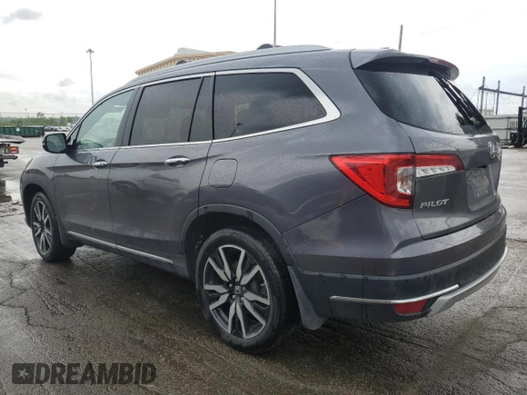 2020 Honda Pilot Touring 7-Passenger z VIN 5FNYF6H68LB052379, wystawiony jako Copart lot #57655775 z przebiegiem 73 501 mil mil oraz Szkoda całkowita • Salvage title. Historia ofert i sprzedaży dostępna na DreamBid. Obrazek 2.