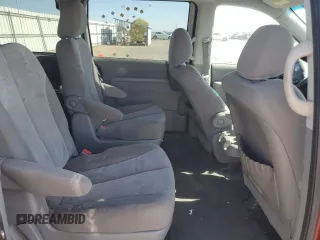 2012 Kia Sedona LX with VIN KNDMG4C79C6483194, listed as a Copart auction lot 77485374 with 110,831 mi miles and Salvage Title. Bid and sale history available at carsss.com. Image 11.