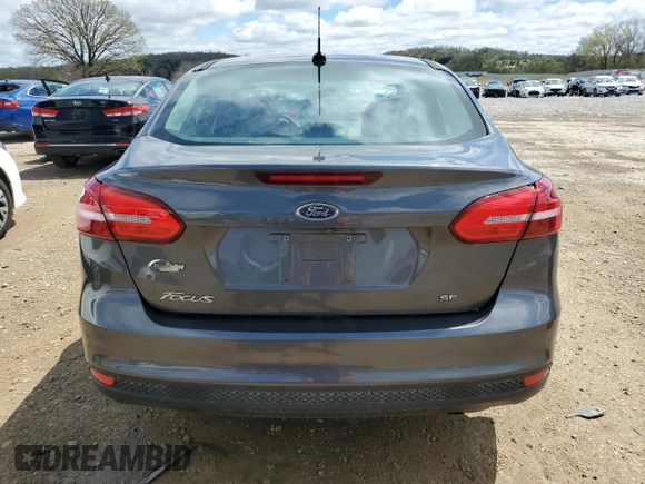 2017 Ford Focus SE with VIN 1FADP3F25HL228597, listed as a Copart auction lot 54885375 with 50,586 mi miles and Non Repairable. Bid and sale history available at DreamBid. Image 6.