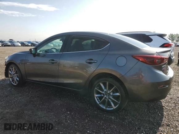 2018 Mazda 3 Grand Touring z VIN 3MZBN1W36JM225021, wystawiony jako Copart lot #61100855 z przebiegiem 155 817 mil mil oraz Czysty tytuł • Clean title. Historia ofert i sprzedaży dostępna na DreamBid. Obrazek 2.