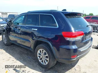 2014 Jeep Grand Cherokee Limited with VIN 1C4RJEBG9EC201512, listed as a IAAI auction lot 42091266 with 129,897 mi miles and . Bid and sale history available at DreamBid. Image 3.