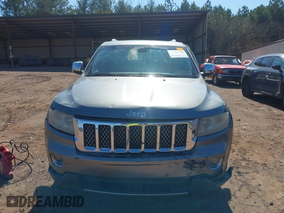 2012 Jeep Grand Cherokee Overland with VIN 1C4RJECT7CC105614, listed as a IAAI auction lot 41629174 with 264,756 mi miles. Bid and sale history available at carsss.com. Image 6.