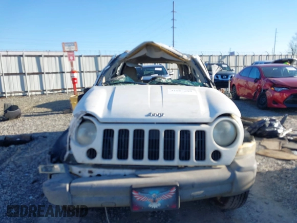 2005 Jeep Liberty Sport with VIN 1J4GK48KX5W679070, listed as a IAAI auction lot 41807899 with 157,726 mi miles. Bid and sale history available at carsss.com. Image 12.