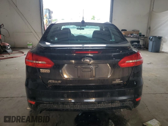 2015 Ford Focus SE с VIN 1FADP3F29FL274320, выставлен на аукционе Copart как лот 55434445 с пробегом 149 126 миль миль и Списание • Salvage title. История ставок и продаж доступна на DreamBid. Изображение 6.