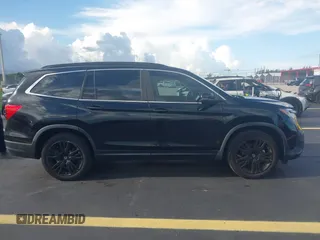 2022 Honda Pilot Special Edition with VIN 5FNYF5H25NB026414, listed as a IAAI auction lot 42590493 with 26,600 mi miles and . Bid and sale history available at DreamBid. Image 13.
