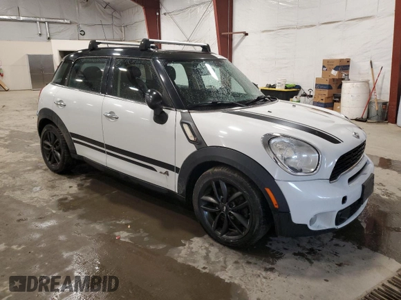 2013 MINI Countryman S ALL4 with VIN WMWZC5C56DWM15763, listed as a Copart auction lot 51165565 with 165,494 mi miles and Salvage Title. Bid and sale history available at DreamBid. Image 4.