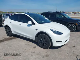 2024 Tesla Model Y with VIN 7SAYGDED9RF161420, listed as a IAAI auction lot 41892788 with 12,353 mi miles and . Bid and sale history available at DreamBid. Image 1.