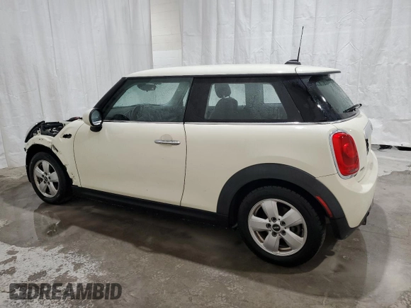 2015 MINI Hardtop with VIN WMWXM5C58FT973235, listed as a Copart auction lot 49988015 with 119,683 mi miles and Salvage Title. Bid and sale history available at DreamBid. Image 2.