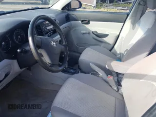 2007 Hyundai Accent GL z VIN KMHCN45C97U146808, wystawiony jako Copart lot #70781004 z przebiegiem Nie podano mil oraz Szkoda całkowita • Salvage title. Historia ofert i sprzedaży dostępna na DreamBid. Obrazek 7.
