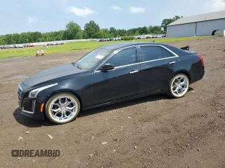 2014 Cadillac CTS AWD with VIN 1G6AW5SX2E0142712, listed as a Copart auction lot 61732365 with 72,933 mi miles and Clean title. Bid and sale history available at DreamBid. Image 1.
