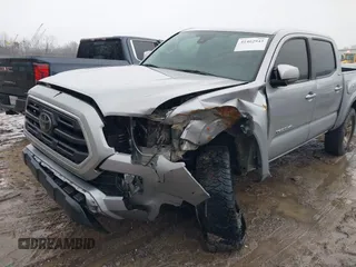 2018 Toyota Tacoma SR with VIN 3TMCZ5AN4JM148581, listed as a IAAI auction lot 41462945 with 115,655 mi miles. Bid and sale history available at carsss.com. Image 6.