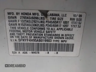 2010 Honda Pilot Touring with VIN 5FNYF4H95AB019903, listed as a IAAI auction lot 42196082 with 233,527 mi miles and . Bid and sale history available at carsss.com. Image 9.
