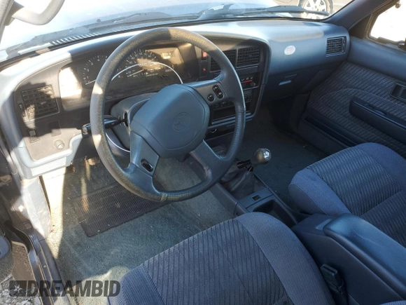 1993 Toyota Pickup SR5 z VIN JT4VN13G0P5124241, wystawiony jako Copart lot #44253055 z przebiegiem 254 494 mil mil oraz Szkoda całkowita • Salvage title. Historia ofert i sprzedaży dostępna na DreamBid. Obrazek 8.