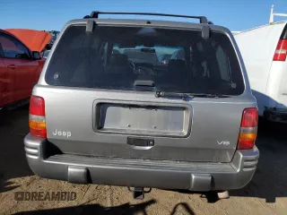 1997 Jeep Grand Cherokee Limited with VIN 1J4GZ78Y4VC568288, listed as a Copart auction lot 88265025 with 185,015 mi miles and Salvage Title. Bid and sale history available at carsss.com. Image 6.