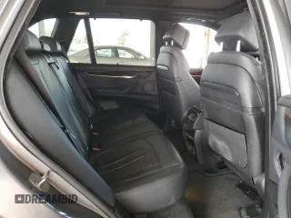 2014 BMW X5 xDrive50i z VIN 5UXKR6C58E0C03414, wystawiony jako Copart lot #47437935 z przebiegiem 126 402 mil mil oraz Szkoda całkowita • Salvage title. Historia ofert i sprzedaży dostępna na DreamBid. Obrazek 10.