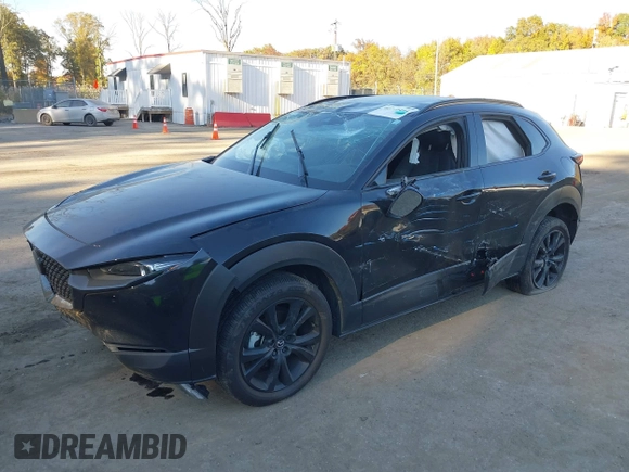 2023 Mazda CX-30 2.5 S Premium Package with VIN 3MVDMBDM5PM536219, listed as a IAAI auction lot 40710444 with 16,863 mi miles. Bid and sale history available at carsss.com. Image 2.