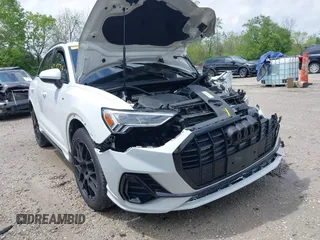 2022 Audi Q3 S line Premium Plus with VIN WA1EECF3XN1007804, listed as a IAAI auction lot 42197719 with 28,466 mi miles and . Bid and sale history available at DreamBid. Image 1.