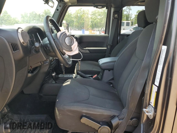 2014 Jeep Wrangler Unlimited Sport with VIN 1C4BJWDG1EL298161, listed as a Copart auction lot 61996735 with 176,043 mi miles and Salvage title. Bid and sale history available at DreamBid. Image 7.