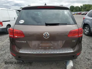 2012 Volkswagen Touareg Lux с VIN WVGEK9BPXCD012003, выставлен на аукционе Copart как лот 54910865 с пробегом 106 465 миль миль и Списание • Salvage title. История ставок и продаж доступна на DreamBid. Изображение 6.