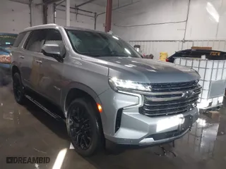 2023 Chevrolet Tahoe LT with VIN 1GNSKNKDXPR504598, listed as a IAAI auction lot 41383754 with 23,033 mi miles. Bid and sale history available at carsss.com. Image 1.