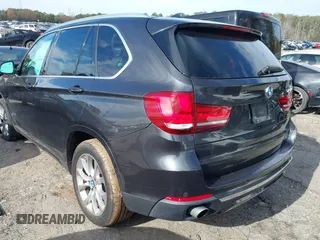 2014 BMW X5 sDrive35i with VIN 5UXKR2C56E0H32059, listed as a IAAI auction lot 41096908 with 124,322 mi miles. Bid and sale history available at carsss.com. Image 3.