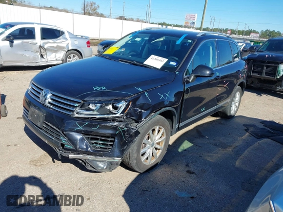 2016 Volkswagen Touareg Sport with VIN WVGEF9BP4GD012265, listed as a IAAI auction lot 41208383 with 69,205 mi miles and . Bid and sale history available at DreamBid. Image 2.