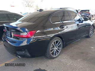 2020 BMW 3 Series 330i with VIN 3MW5R1J01L8B03676, listed as a IAAI auction lot 41948528 with 112,440 mi miles. Bid and sale history available at carsss.com. Image 4.