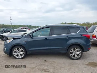 2019 Ford Escape Titanium with VIN 1FMCU9J95KUC19062, listed as a IAAI auction lot 42112188 with 26,100 mi miles. Bid and sale history available at carsss.com. Image 13.