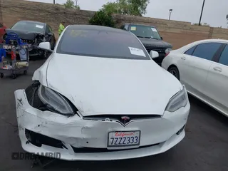2017 Tesla Model S 60 with VIN 5YJSA1E19HF189578, listed as a IAAI auction lot 42374977 with 40,844 mi miles and . Bid and sale history available at DreamBid. Image 13.