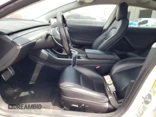2018 Tesla Model 3 Long Range Battery with VIN 5YJ3E1EAXJF031944, listed as a Copart auction lot 53619445 with 146,031 mi miles and Salvage Title. Bid and sale history available at DreamBid. Image 7.