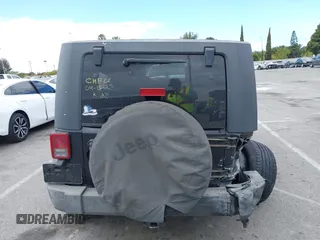 2007 Jeep Wrangler Unlimited X with VIN 1J4GB391X7L172965, listed as a IAAI auction lot 42040337 with 170,482 mi miles and . Bid and sale history available at DreamBid. Image 16.