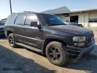 2001 GMC Yukon Denali with VIN 1GKEK63U61J224021, listed as a Copart auction lot 72157364 with 213,778 mi miles and Clean Title. Bid and sale history available at carsss.com. Image 4.