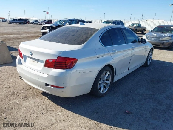 2014 BMW 5 Series 528i with VIN WBA5A5C57ED504582, listed as a IAAI auction lot 41699668 with 113,792 mi miles. Bid and sale history available at carsss.com. Image 4.
