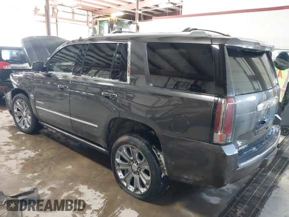 2016 GMC Yukon Denali with VIN 1GKS2CKJ8GR215954, listed as a IAAI auction lot 41362739 with 143,982 mi miles. Bid and sale history available at carsss.com. Image 3.