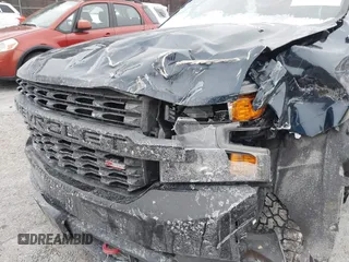 2021 Chevrolet Silverado 1500 Custom Trail Boss with VIN 1GCPYCEF1MZ433544, listed as a IAAI auction lot 41240358 with 71,041 mi miles and . Bid and sale history available at DreamBid. Image 11.
