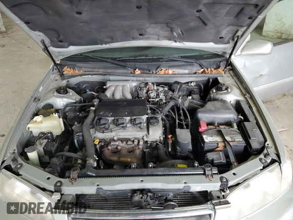 2001 Toyota Camry LE z VIN 4T1BF28K21U963819, wystawiony jako Copart lot #54551465 z przebiegiem 199 472 mil mil oraz Szkoda całkowita • Salvage title. Historia ofert i sprzedaży dostępna na DreamBid. Obrazek 11.