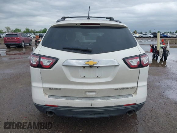 2014 Chevrolet Traverse LTZ with VIN 1GNKRJKD9EJ168099, listed as a IAAI auction lot 41955937 with 171,371 mi miles and . Bid and sale history available at DreamBid. Image 16.