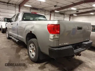 2010 Toyota Tundra 4WD Truck SR with VIN 5TFCW5F1XAX010360, listed as a IAAI auction lot 41784003 with 295,421 mi miles. Bid and sale history available at carsss.com. Image 3.