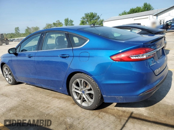 2017 Ford Fusion Hybrid SE with VIN 3FA6P0LU3HR234056, listed as a Copart auction lot 61430935 with 142,164 mi miles and Salvage title. Bid and sale history available at DreamBid. Image 2.