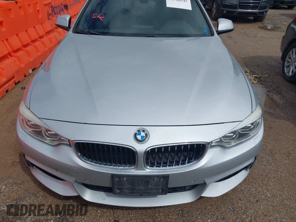 2015 BMW 4 Series 428i xDrive with VIN WBA4C9C50FD330482, listed as a IAAI auction lot 42116547 with 192,739 mi miles and . Bid and sale history available at DreamBid. Image 12.