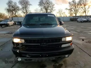 2001 Chevrolet Suburban LS z VIN 3GNFK16T91G221421, wystawiony jako Copart lot #87094634 z przebiegiem 186 977 mil mil oraz Szkoda całkowita • Salvage title. Historia ofert i sprzedaży dostępna na DreamBid. Obrazek 12.