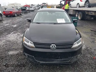 2014 Volkswagen Jetta TDI w/Premium with VIN 3VWLL7AJ1EM406360, listed as a IAAI auction lot 41857580 with 93,333 mi miles and . Bid and sale history available at DreamBid. Image 12.
