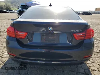 2016 BMW 4 Series 428i z VIN WBA4A9C59GG696298, wystawiony jako Copart lot #52348325 z przebiegiem 87 319 mil mil oraz Szkoda całkowita • Salvage title. Historia ofert i sprzedaży dostępna na DreamBid. Obrazek 6.