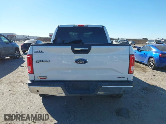 2015 Ford F-150 XLT with VIN 1FTEW1EF4FKD09118, listed as a IAAI auction lot 41414605 with 136,073 mi miles. Bid and sale history available at carsss.com. Image 16.